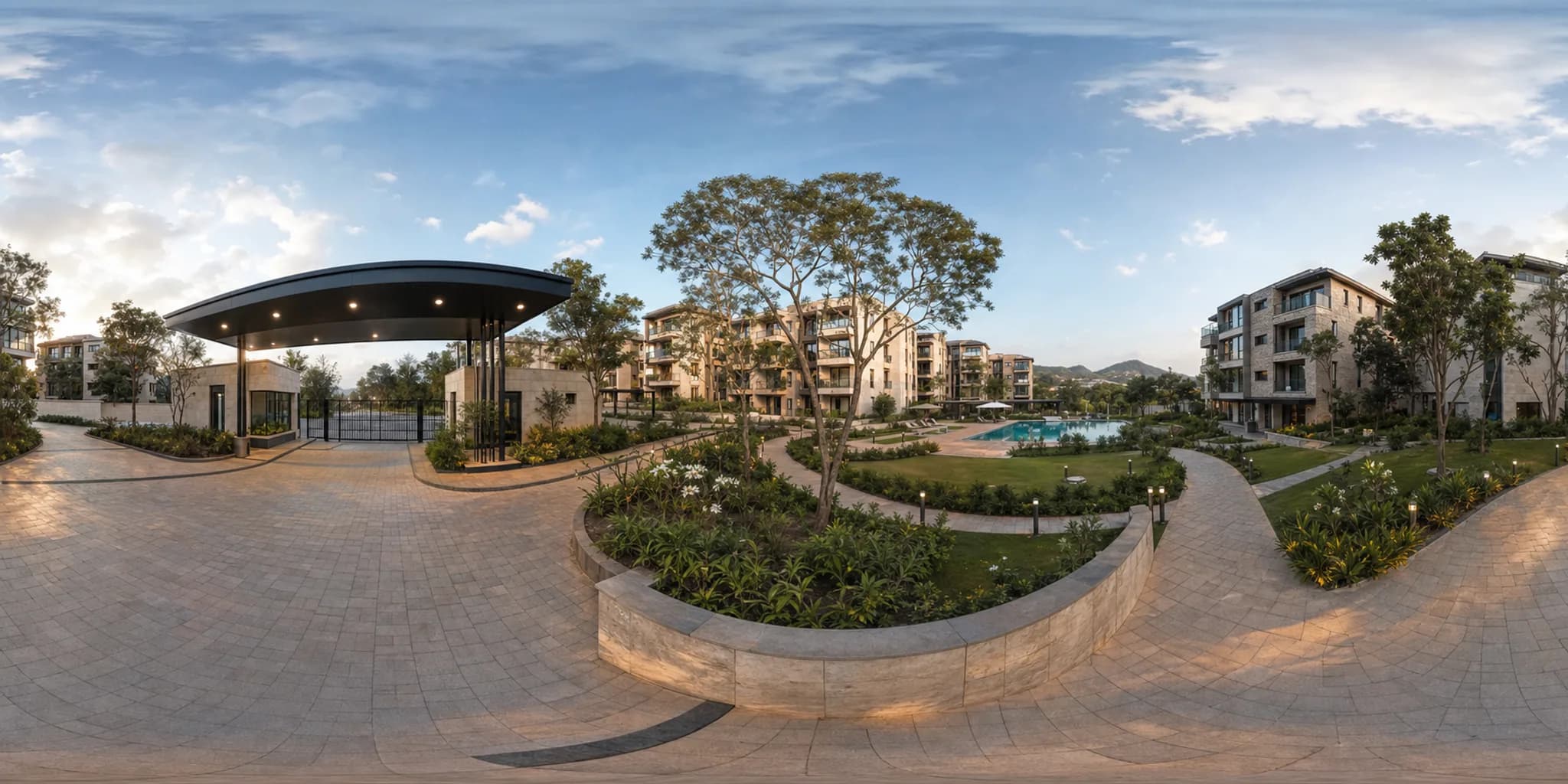 A landscaped arrival court connecting the development entrance, residential blocks, pool and pedestrian paths.
